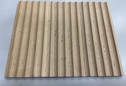 Photo of wooden plank with relief profile, suitable for interior finishing.