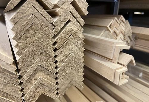 Solid wood blanks with clear geometry, stacked on the warehouse