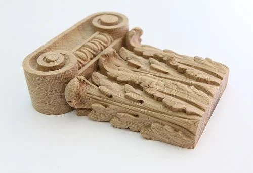 Wooden decorative element with relief carving