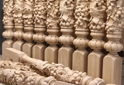 Decorative carved wooden balusters in classic style.