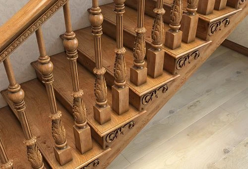Decorative wooden balusters with correct spacing calculation on staircase tread