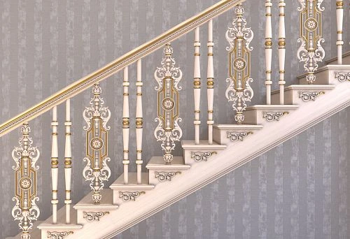 Decorative wooden stair railings with carved balusters and gold accents