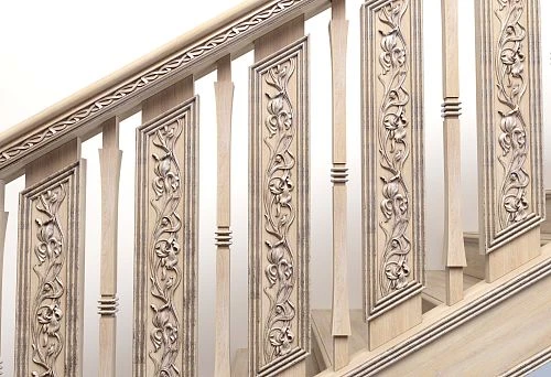 Light wooden staircase railings with carved panels and geometrically precise baluster-to-handrail connections