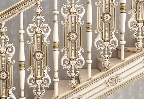 Elegant staircase with white and gilded carved balusters in classic style