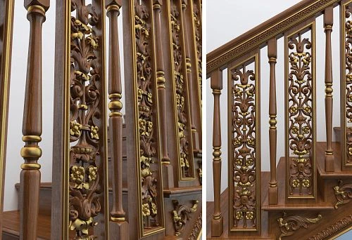 Decorative balusters with carving and gold accents on the staircase &mdash; overall view
