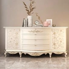 Curved wooden legs for a chest of drawers