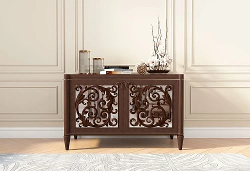 Commode made of natural wood with carved fronts in a classic interior
