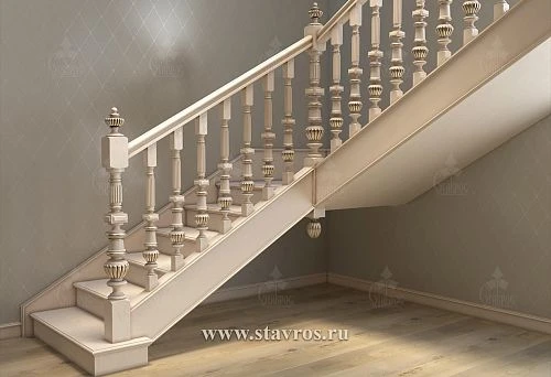 Light balusters with carved decoration and gilding in a classical interior