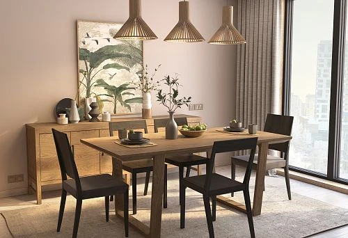 Modern dining room with a large solid wood table and black chairs