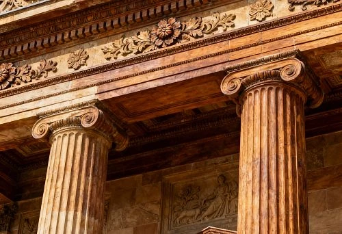 Facade Decor with Columns and Carved Elements in Classic Style