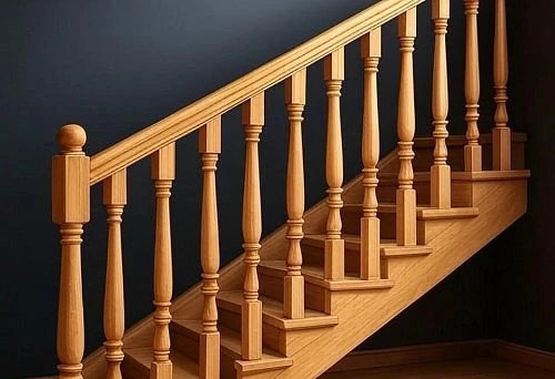 Wooden staircase with classic balusters of standard height against a dark wall
