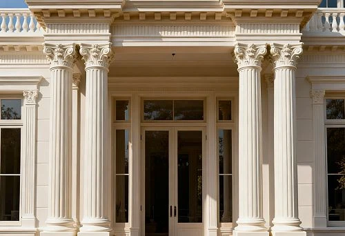 House facade with classical columns and decorative street decor