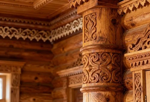 Wooden facade decor with carving &mdash; column and window trims in Russian style