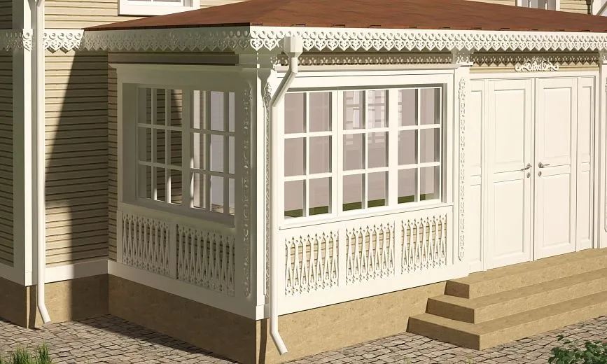 Close-up of a glassed veranda with carved balusters and delicate patterns.
