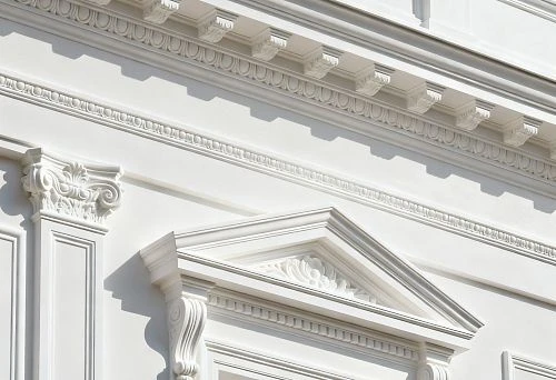 Polyurethane facade decor in classical style with cornices, columns and pediment