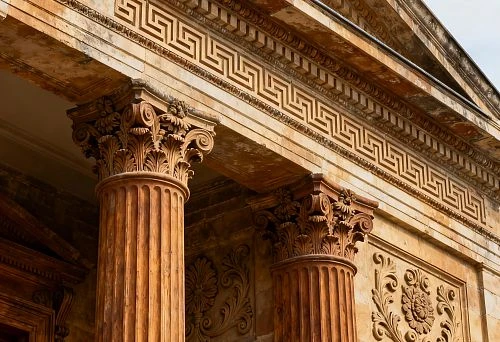 Facade decor with columns and architectural stucco for exterior finishing