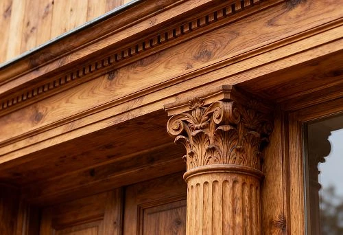 Wooden facade decor in Saint Petersburg with carved columns and classical ornamentation