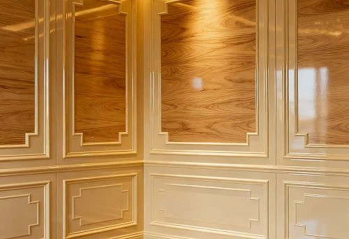 Wall decoration in a classic style with elements of wood and polyurethane