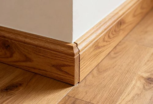 Close-up of Natural Wood Skirting on Floor