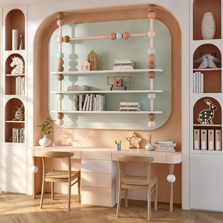 Shelving unit for the children's room with round elements and three shelves, built into an arched niche above the desk.