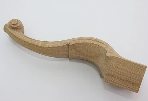 Curved furniture leg made of solid wood for a classic interior.