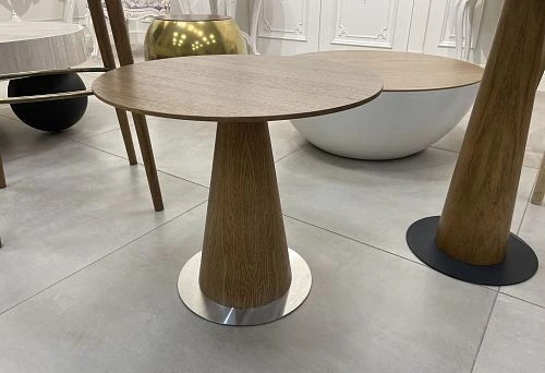 Handcrafted round oak table with conical leg and metal base