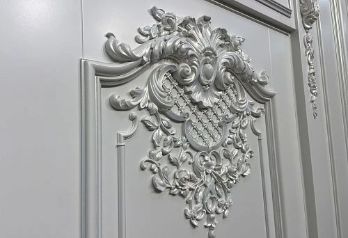 Beautiful wall molding with elegant ornament and floral decor