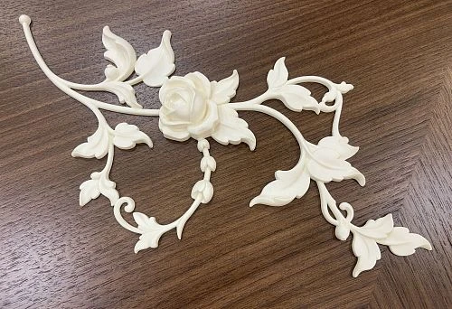 Carving Element in the Form of a Rose and Leaves as an Example of Modern Production