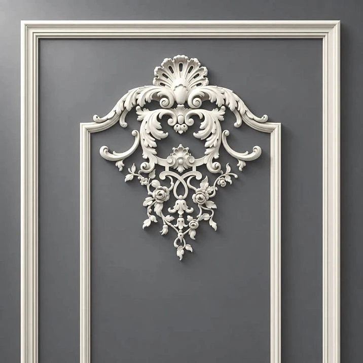 CPU-5-2 top decor close-up: Baroque ornament with scrolls, a shell, and floral motifs against a classic frame