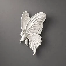 Molding decoration NPU-482R in the form of a butterfly, close-up