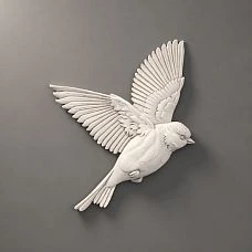 NPU-493L relief decoration &mdash; a decorative applique in the form of a bird with spread wings made of polyurethane.