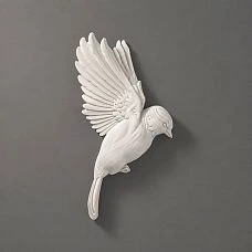 NPU-494L plaster decor&mdash;three-dimensional image of a decorative bird in flight, crafted using elegant plaster technique.