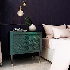 Nightstand with wooden legs MN-148 in the bedroom