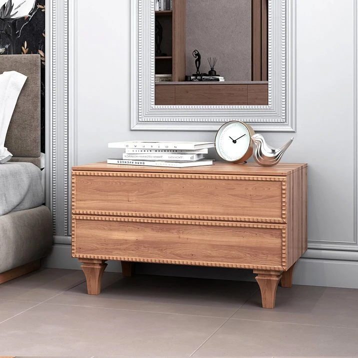 Furniture leg MN-204M on a solid wood chest in a modern bedroom interior