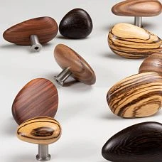 Pebble HL-065-2M handle made of walnut with white oil, in a streamlined pebble shape for children's furniture, shelves, and stylish cabinets