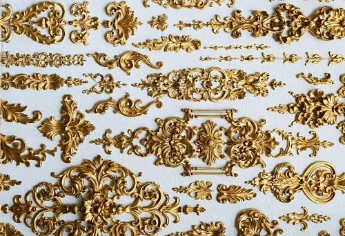 Collection of exquisite gold decorative elements for decorating ceilings and interiors.
