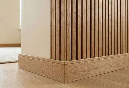 Wooden batten, corner and skirting board in a neat wall finish without plastic trims