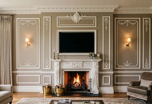 Stucco decor for a wall with a TV and fireplace: how to combine the TV area, portal, and moldings