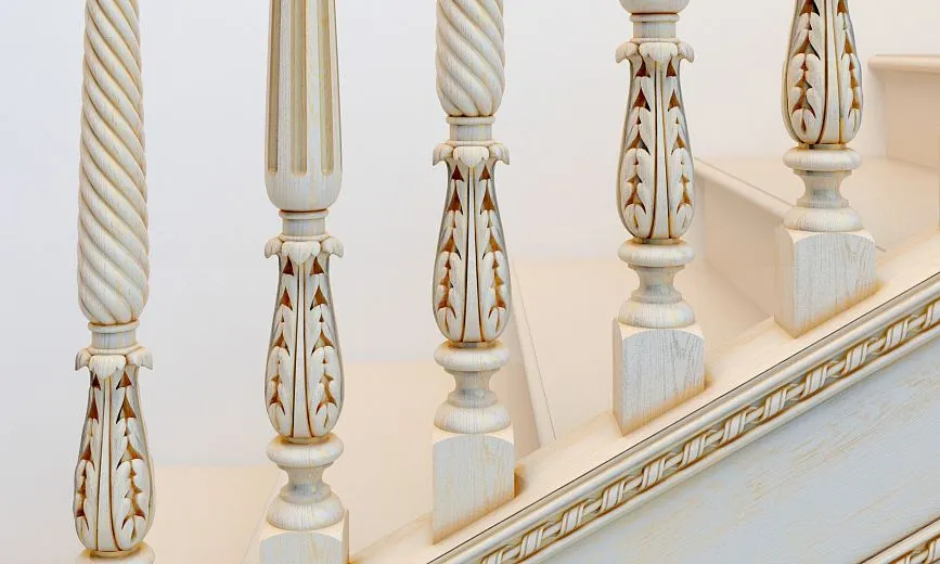 Close-up of carved balusters with floral ornament on staircase RLE-033