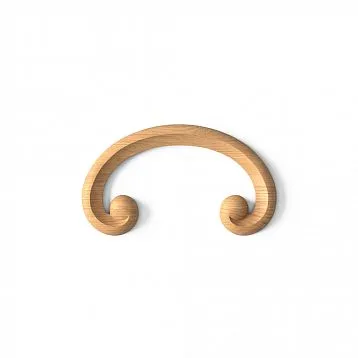 Exquisite wood carving that serves as a decorative element for decorating furniture and other interior items.
