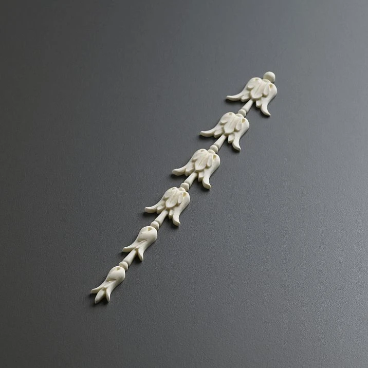 Carved polyurethane overlay NPU-316, vertical composition with floral buds. Elegant Stavros molding for walls, doors, and furniture, ready for painting.