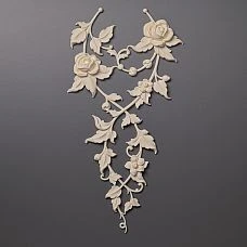 Stucco decoration &ndash; decorative applique with rose motifs made of polyurethane photo