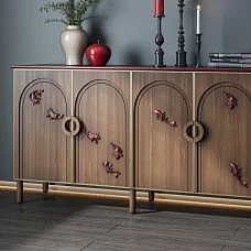 Original panel with decorative fish made of polyurethane on a wooden chest of drawers.