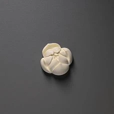 NPU-496 molded decor on a cabinet in an interior from the 'Summer Garden' collection