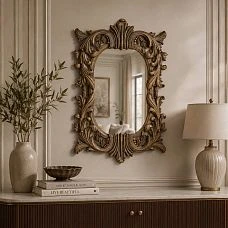 Frame RM-007 for a mirror in an interior with elegant decorative details.