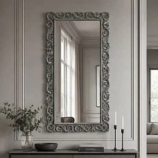 Carved frame RM-014 for a mirror in an interior with baroque elements.