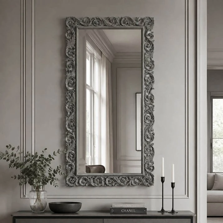 Carved frame RM-014 for a mirror in an interior with baroque elements.