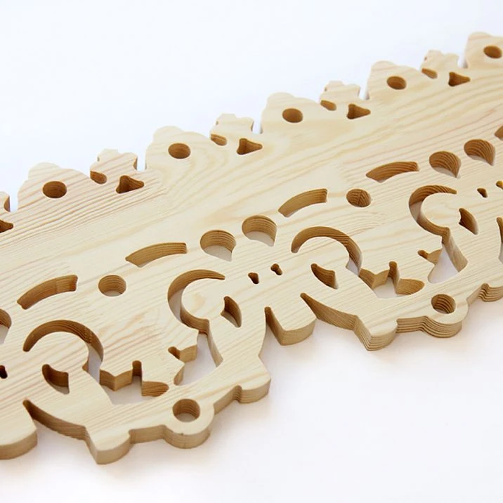Carved Door Stop NL-8 from pine, close-up photo