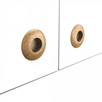 Wooden furniture handles on the facade