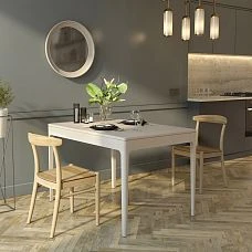 Norton 002-009 wooden table in an interior with wooden furniture